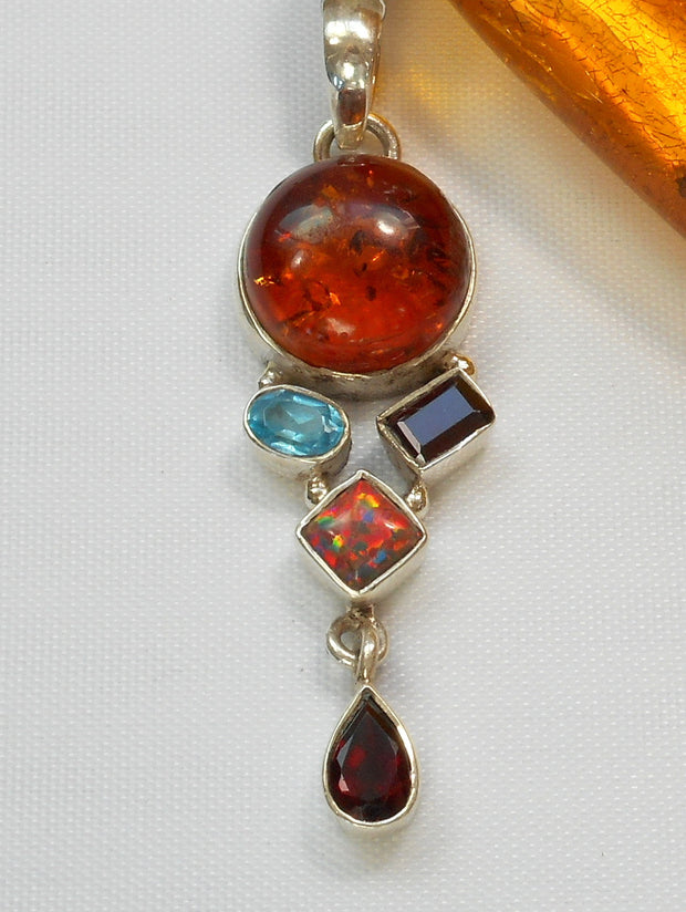 Amber Pendant 8 with Topaz, Garnets and Opal